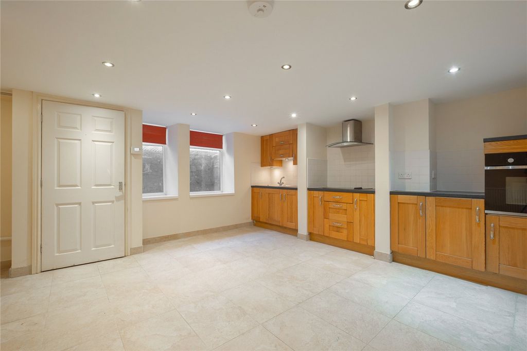 Property photo 3 of 11 Dining Kitchen