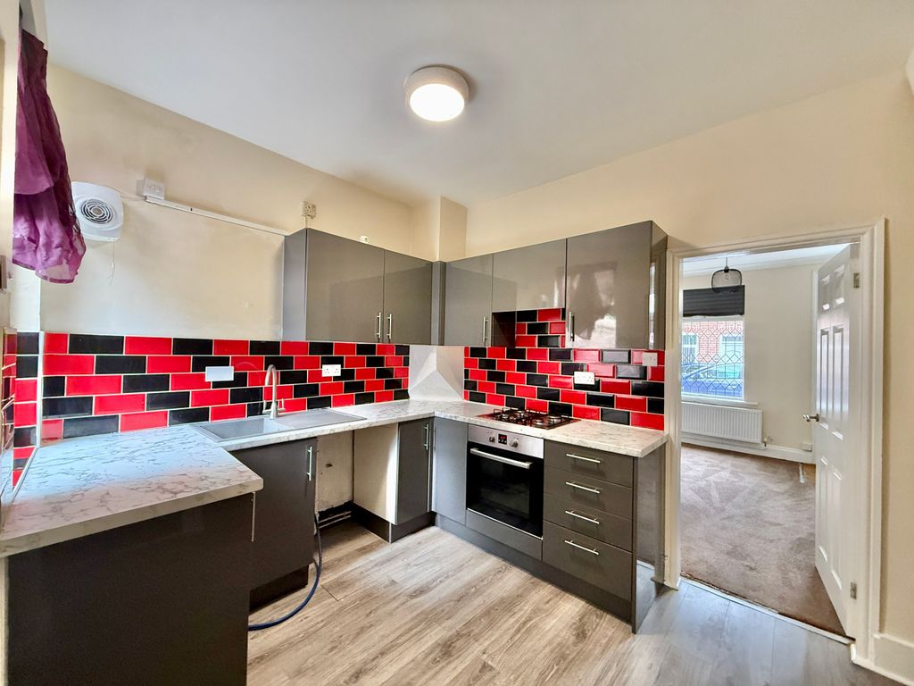 Property photo 3 of 9 Kitchen