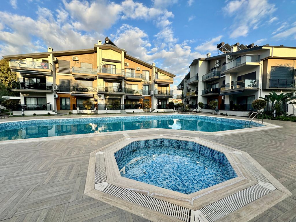 Property photo 1 of 21 Blissful Property For Sale Near The Beach In Fethiye - A Delightful Complex With Shared Pool