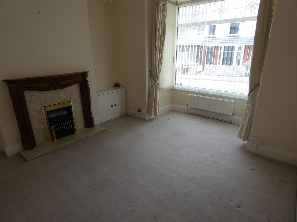Property photo 2 of 13 Front Lounge