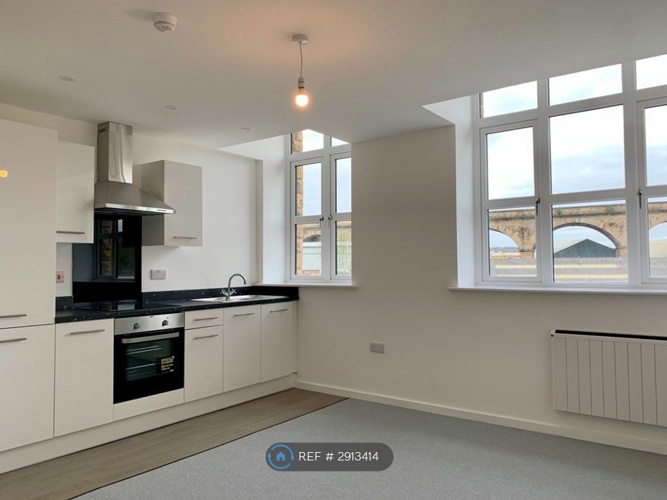 Property photo 2 of 12 Kitchen/Living 1 - Before Blinds Installation