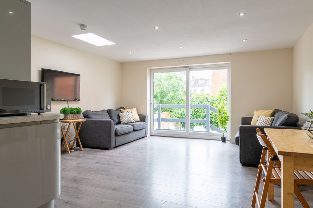 Property photo 1 of 9 Bright Modern Living Room With Large Sliding Doors...