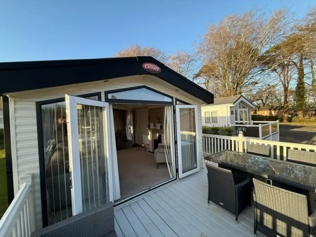 Property photo 1 of 23 Exterior With Decking And Patio Doors In The Carnaby Helmsley Holiday Caravan At Plas Coch Country &amp; Leisure Retreat, Wales