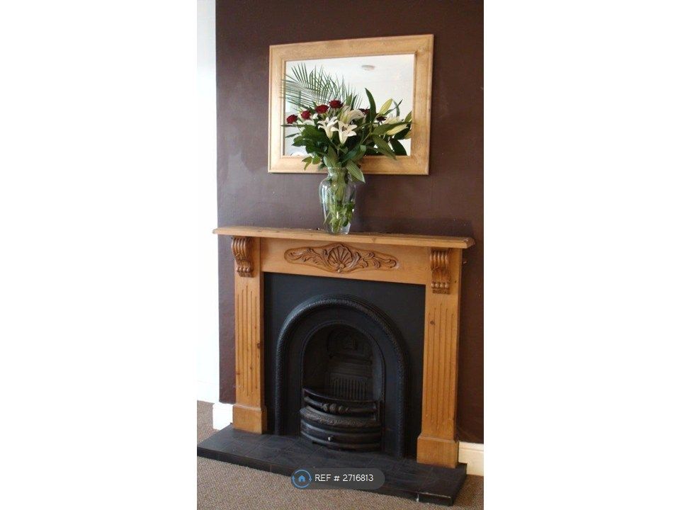 Property photo 3 of 19 Lounge Fireplace