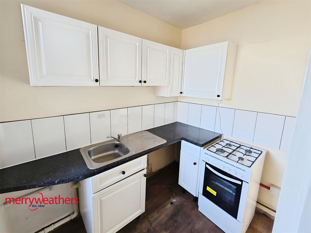 Property photo 3 of 7 Kitchen