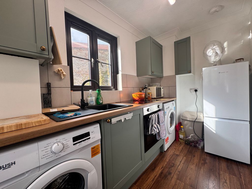 Property photo 3 of 13 Kitchen