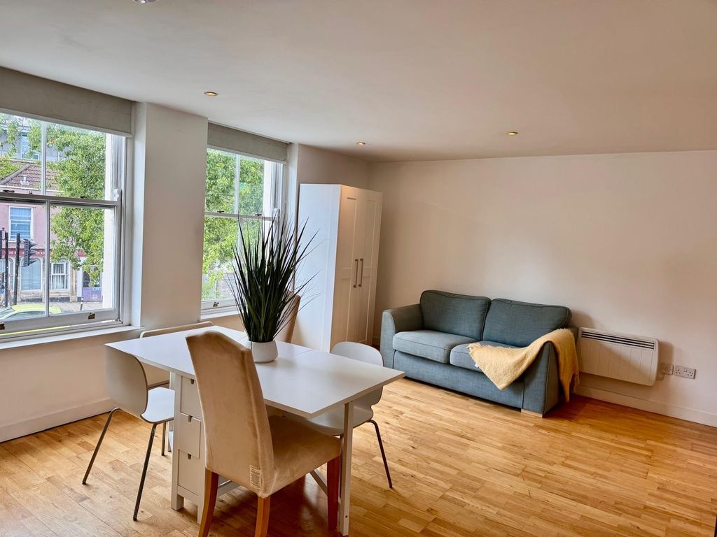 Property photo 3 of 7 Bright, Open Living Area With Modern Furnishings...