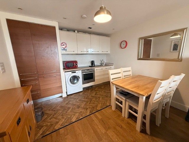 Property photo 3 of 12 Kitchen