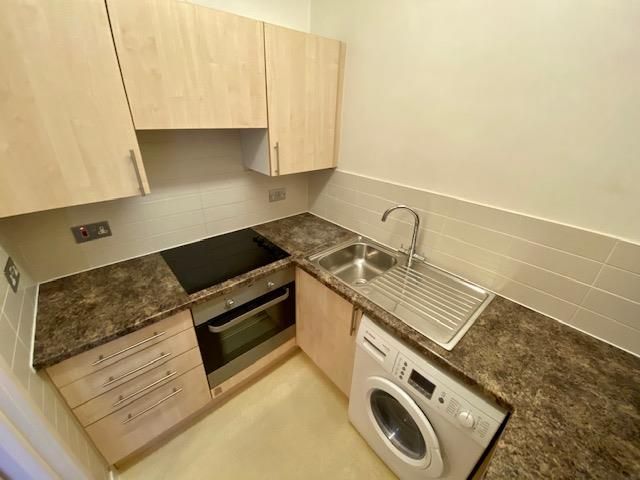 Property photo 1 of 8 Kitchen