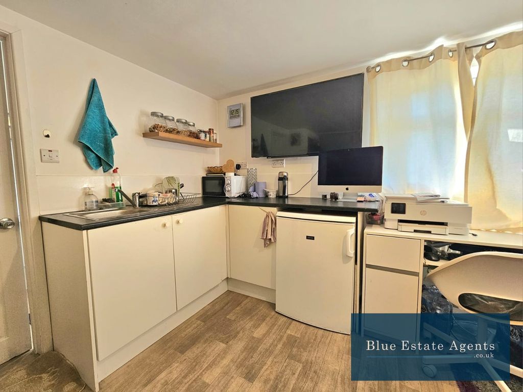 Property photo 2 of 3 Kitchen Area