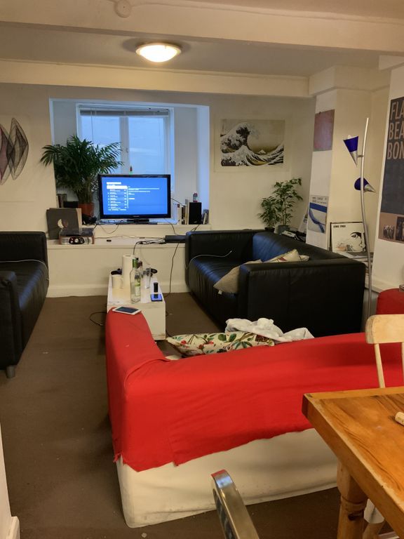 Property photo 2 of 19 A Contemporary And Inviting Living Room With A Com...