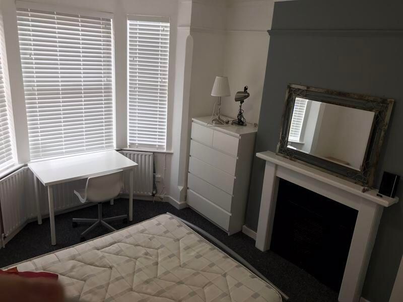 Property photo 3 of 6 A Spacious Master Bedroom Featuring A Large Bed, A...