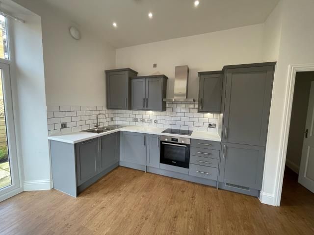 Property photo 3 of 8 Kitchen