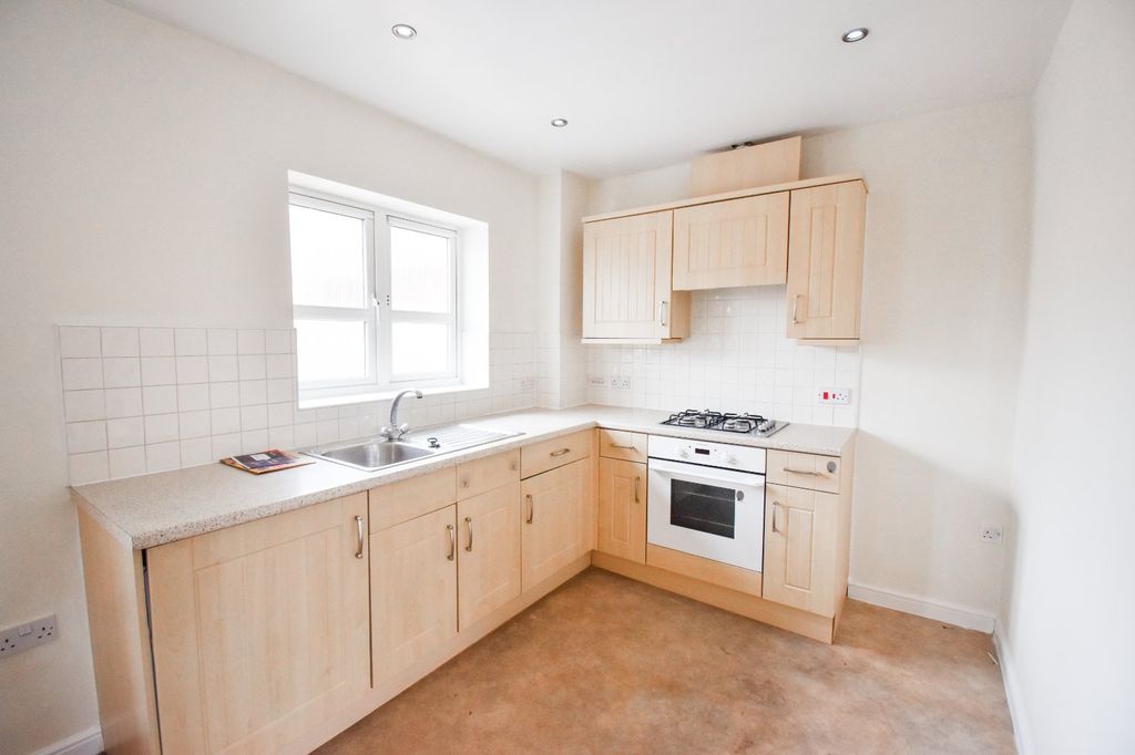 Property photo 2 of 11 Kitchen Area