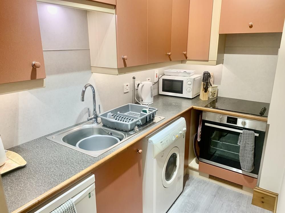 Property photo 3 of 6 Kitchen