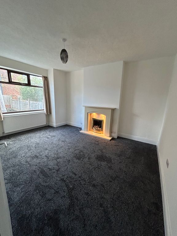 Property photo 3 of 12 Living Room