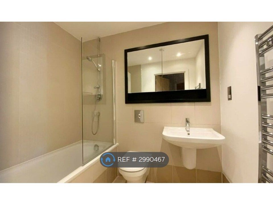 Property photo 3 of 8 Bathroom With Bath