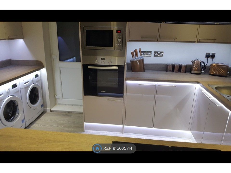 Property photo 3 of 12 Designer Kitchen