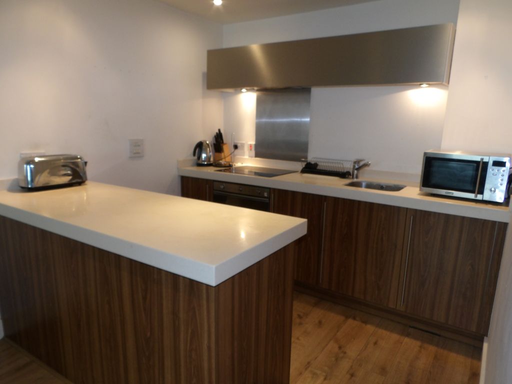 Property photo 3 of 8 Kitchen