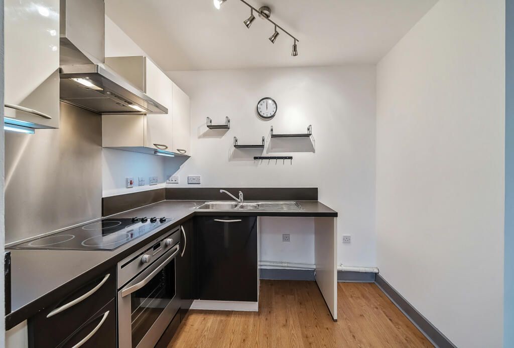 Property photo 3 of 12 Kitchen