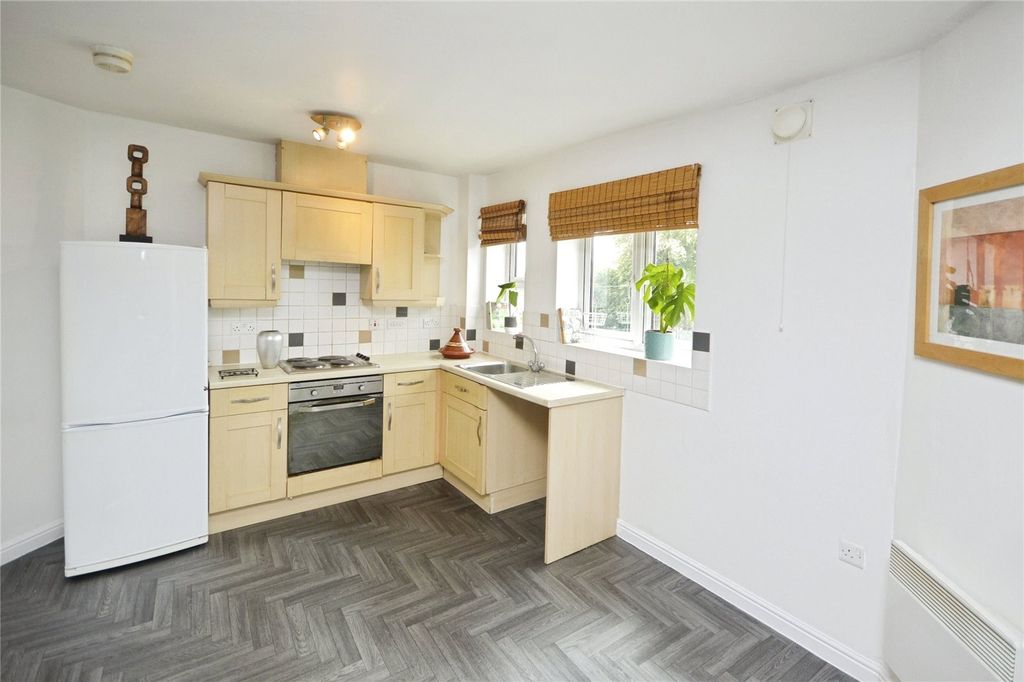Property photo 3 of 13 Kitchen Area