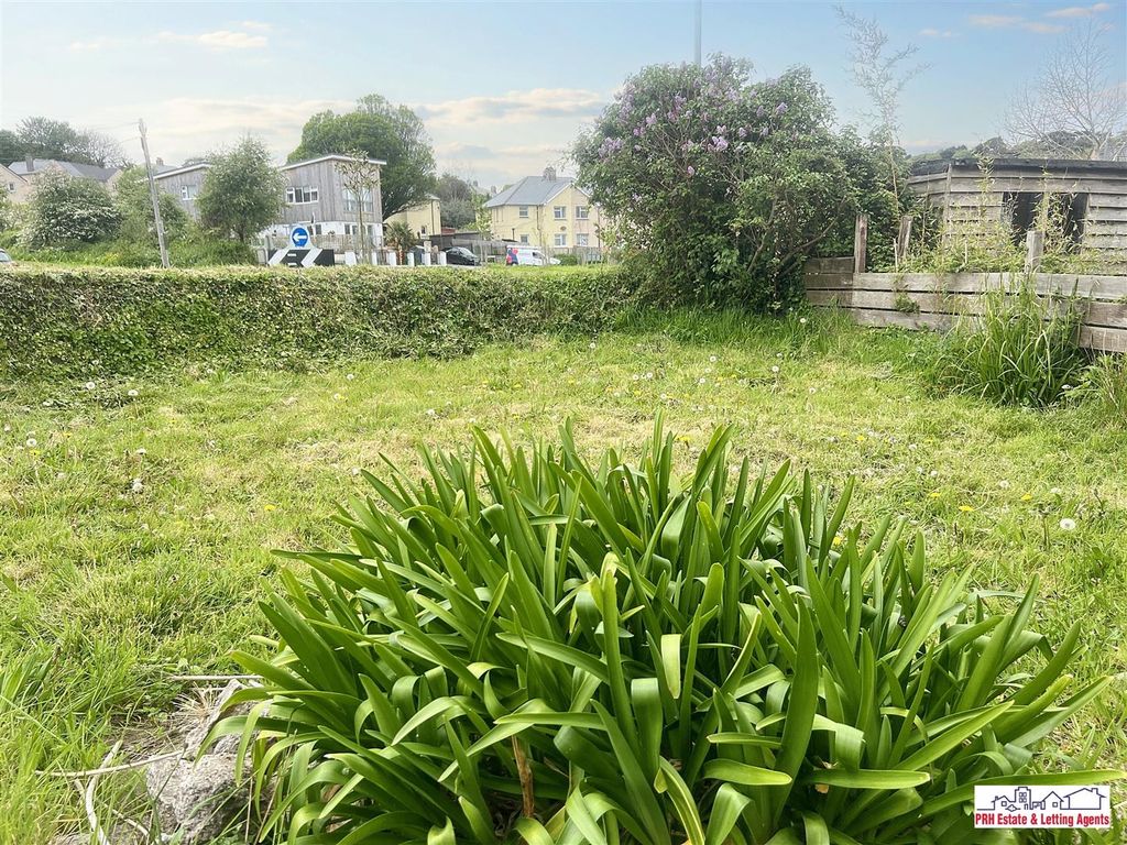 Property photo 2 of 12 Elevations &amp; Gardens