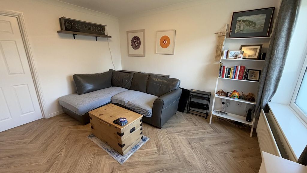 Property photo 3 of 12 Living Room