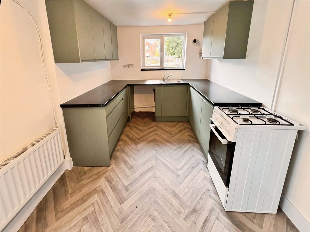 Property photo 3 of 12 Kitchen
