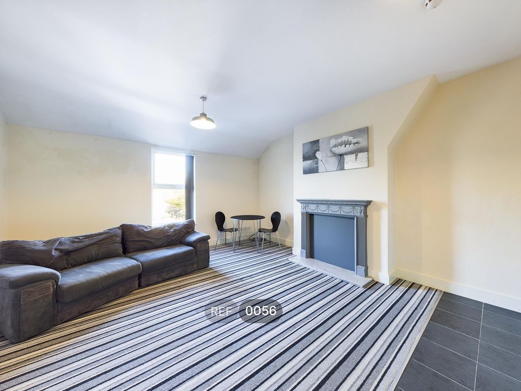 Property photo 2 of 7 Kitchen & Living Area