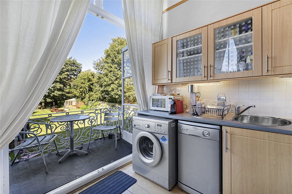 Property photo 2 of 9 Kitchen-Balcony