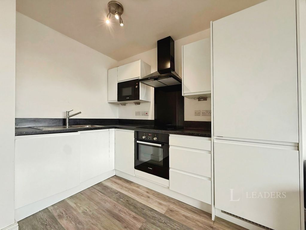 Property photo 2 of 8 Kitchen Area