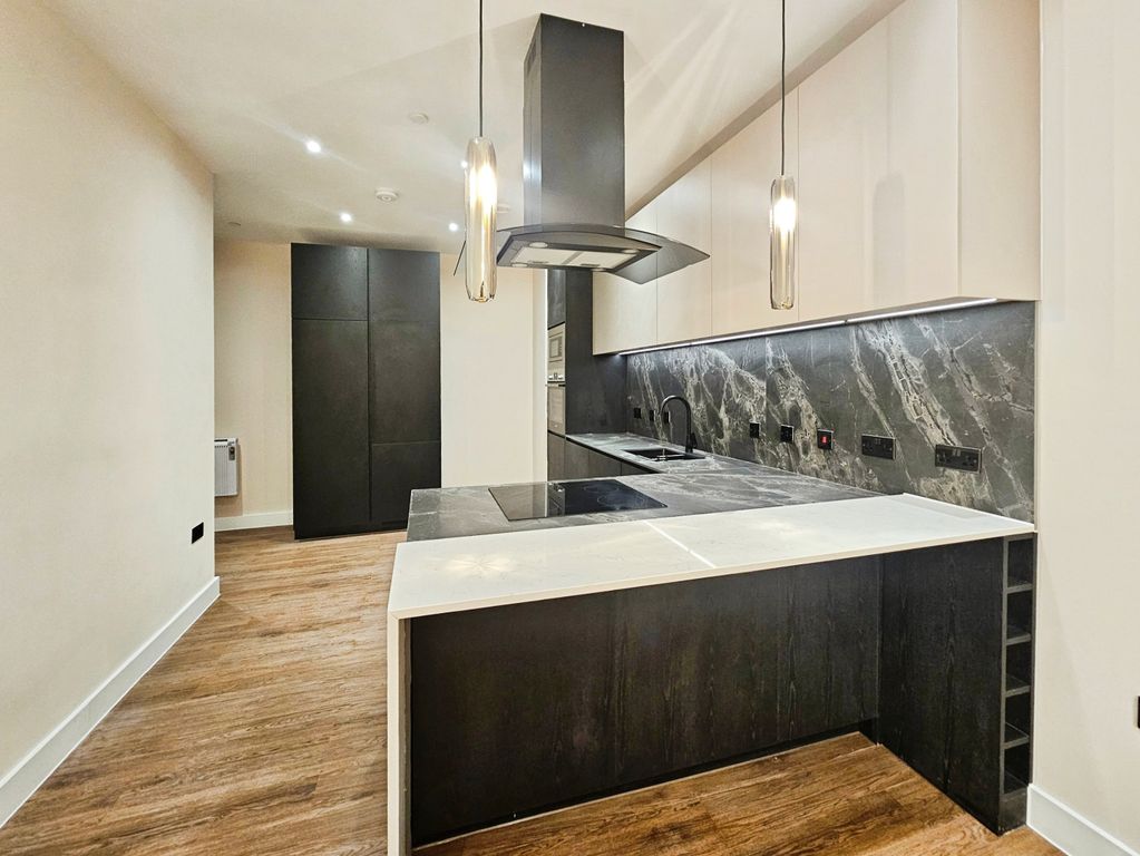 Property photo 3 of 13 Kitchen Living