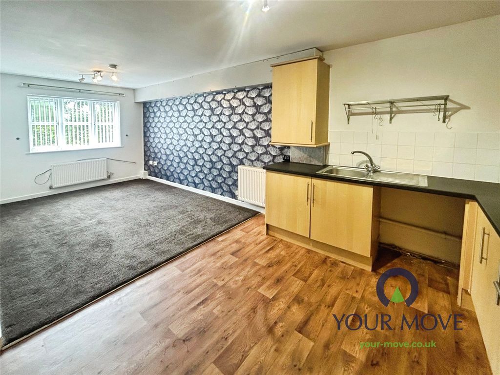 Property photo 2 of 7 Kitchen Living