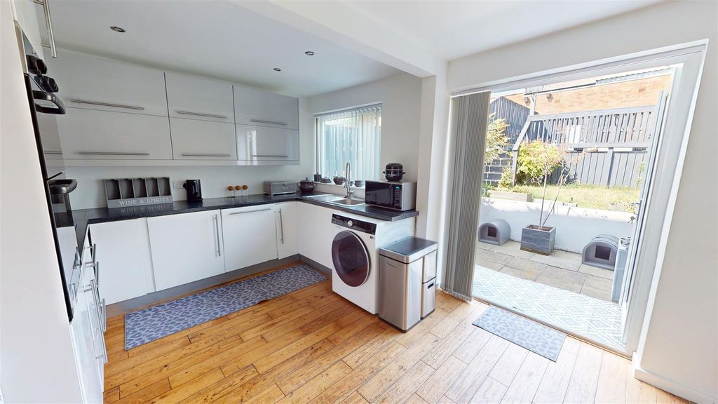 Property photo 3 of 13 Dining Kitchen