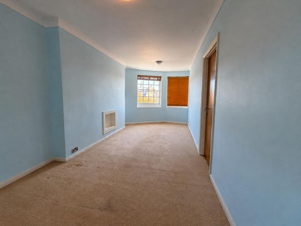 Property photo 1 of 7 Serene Blue Hallway With Bay Windows.Png