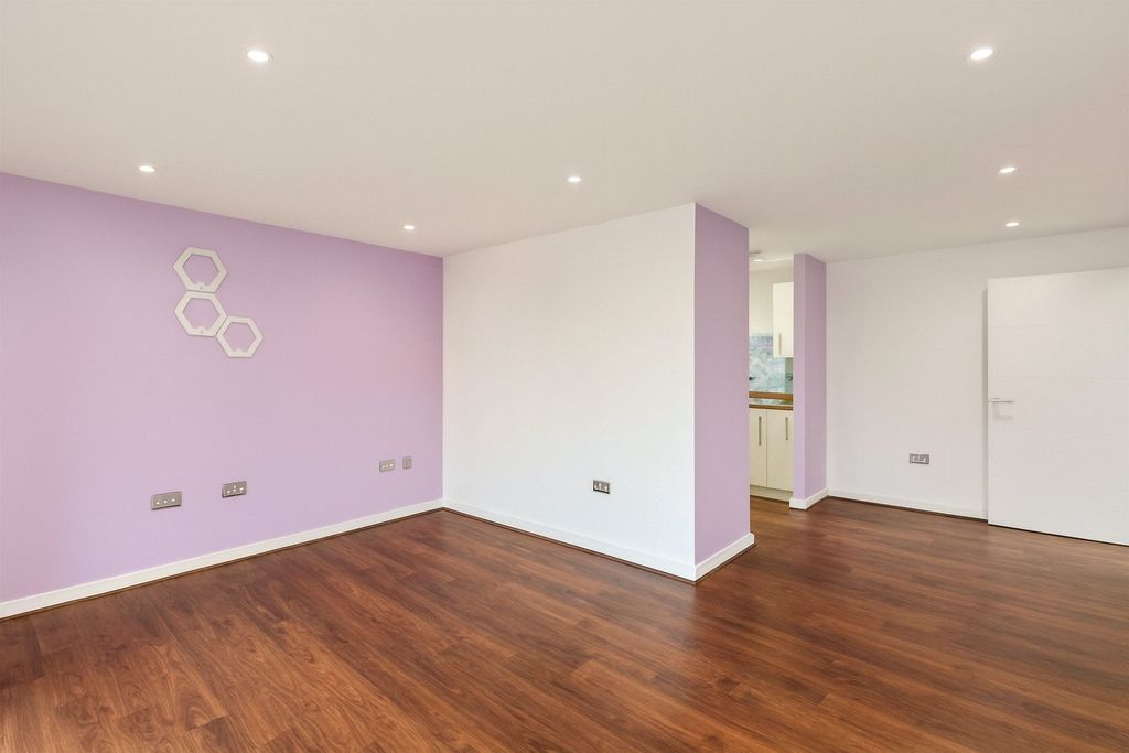 Property photo 3 of 9 Living Area