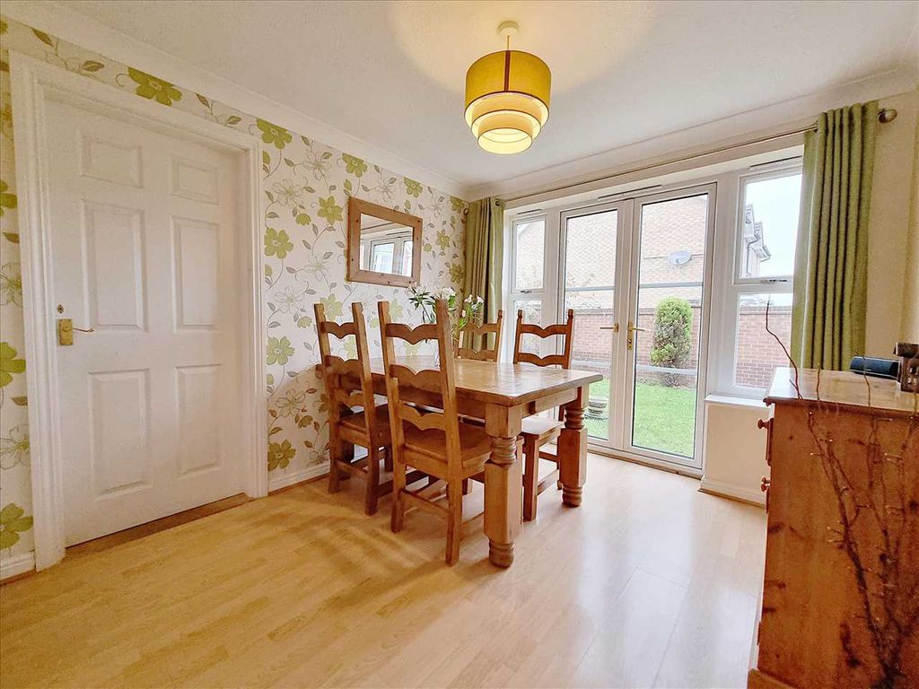 Property photo 3 of 11 Dining Room: