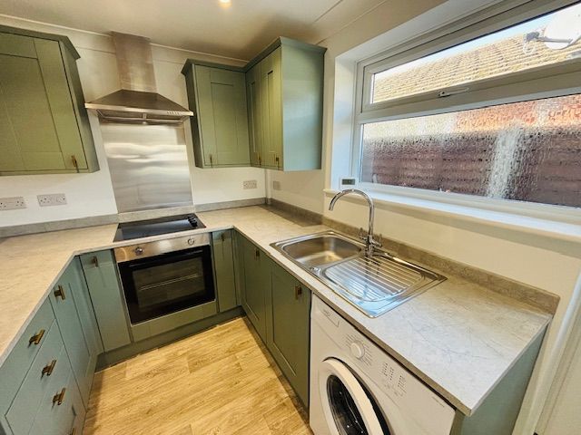 Property photo 2 of 12 Kitchen