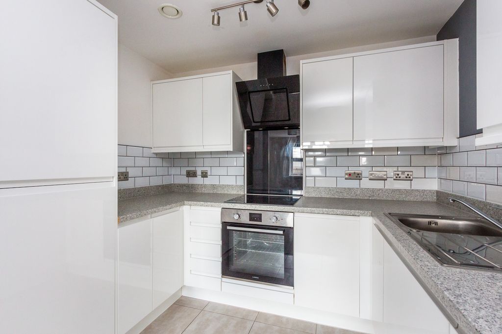 Property photo 3 of 6 Kitchen Area