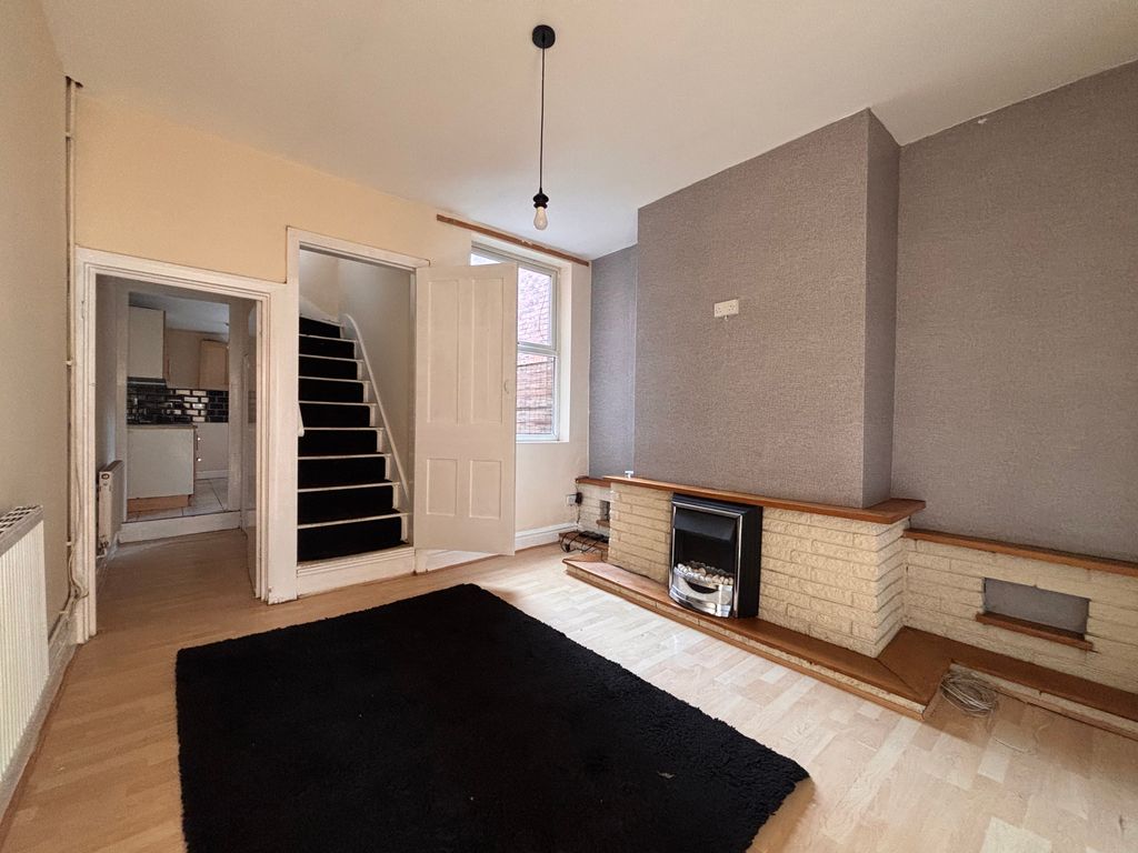 Property photo 3 of 10 Middle Lounge And Stairs