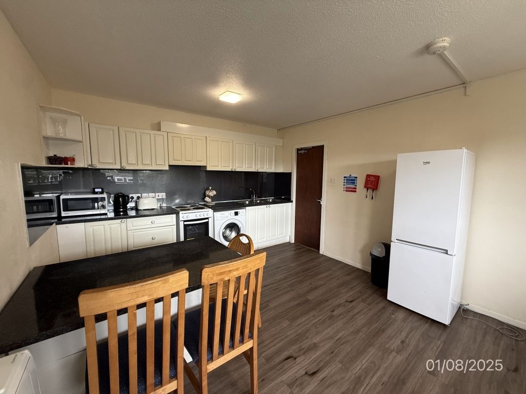 Property photo 2 of 10 Kitchen Area