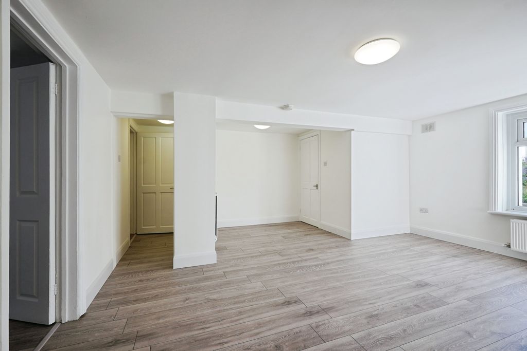 Property photo 3 of 12 Living Area
