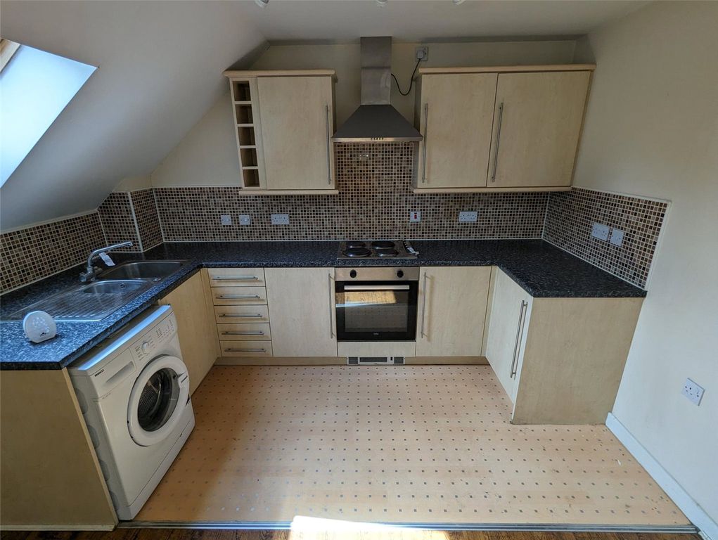 Property photo 3 of 12 Kitchen