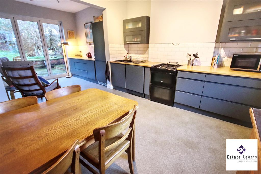 Property photo 2 of 24 Dining Kitchen