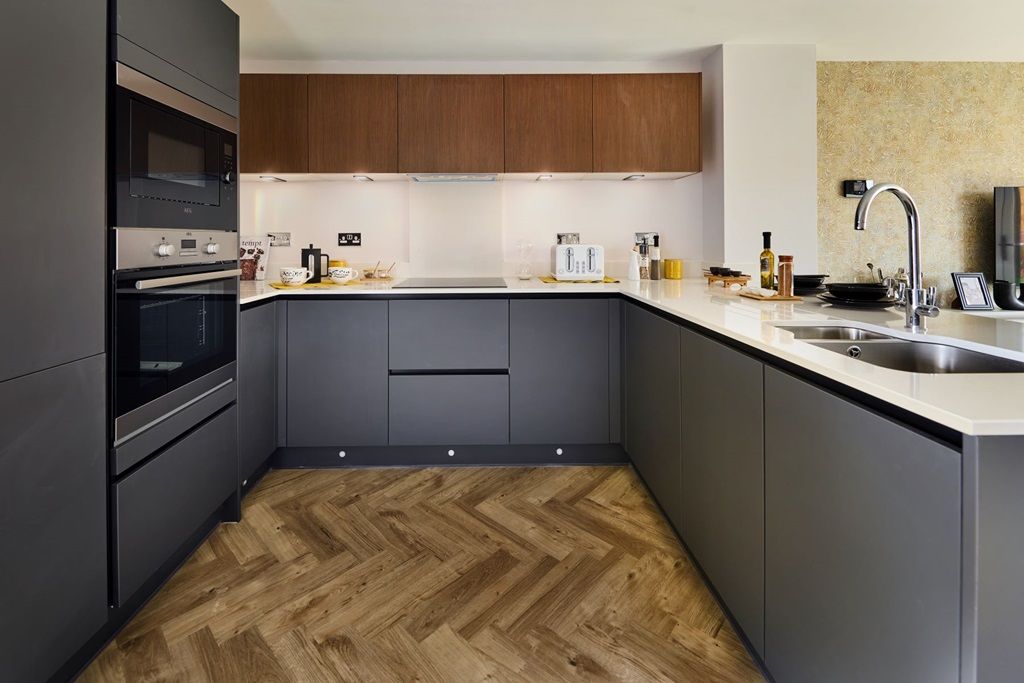 Property photo 3 of 12 The Kitchen Features A Useful Breakfast Bar