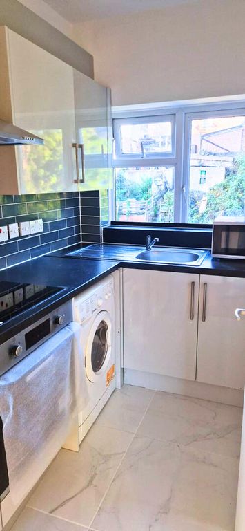 Property photo 3 of 6 Kitchen