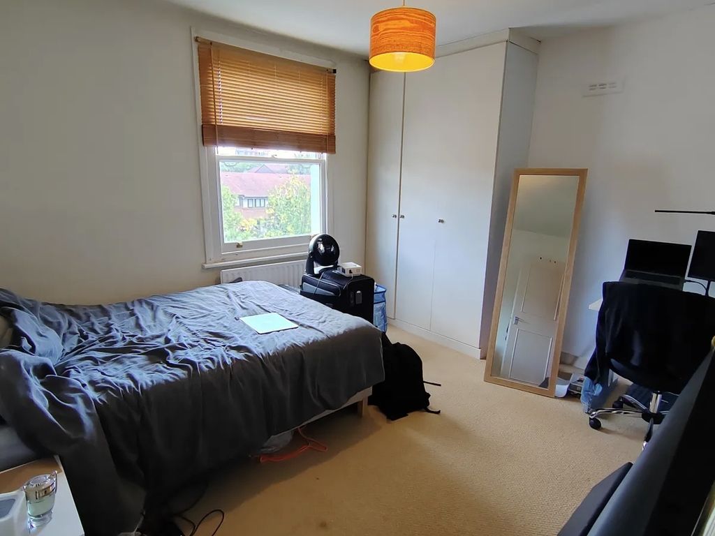 Property photo 2 of 7 Bright Bedroom With Built-In Storage And Desk...