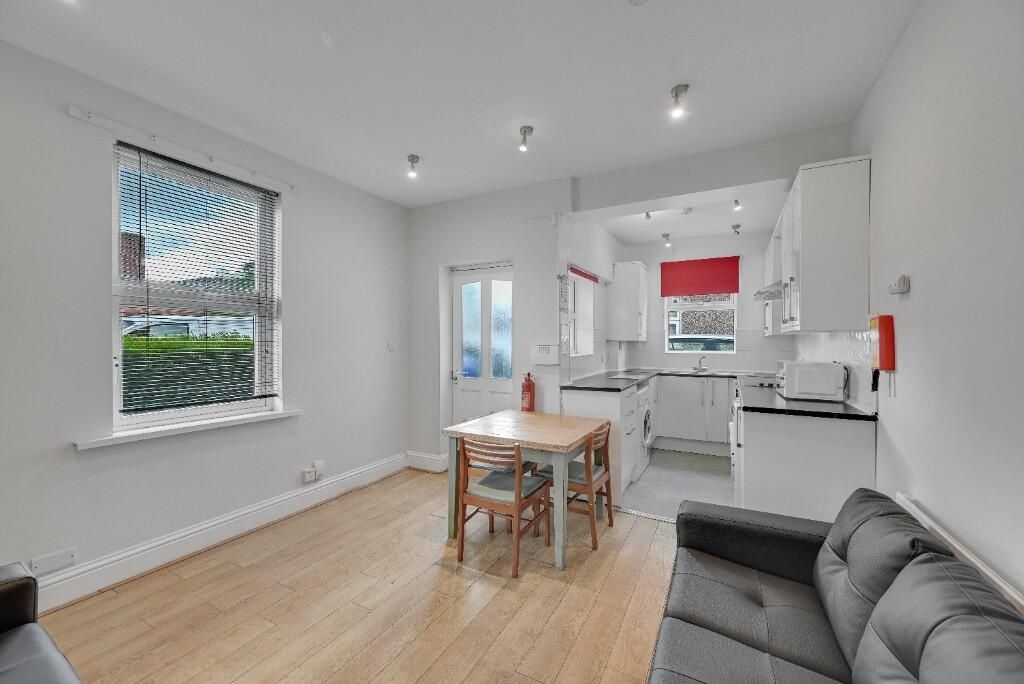 Property photo 2 of 11 Bright And Modern Living Room With A Sleek Kitchen...