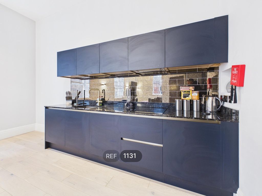 Property photo 2 of 29 Kitchen / Living Area