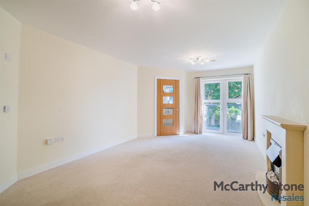 Property photo 3 of 16 Living Room:
